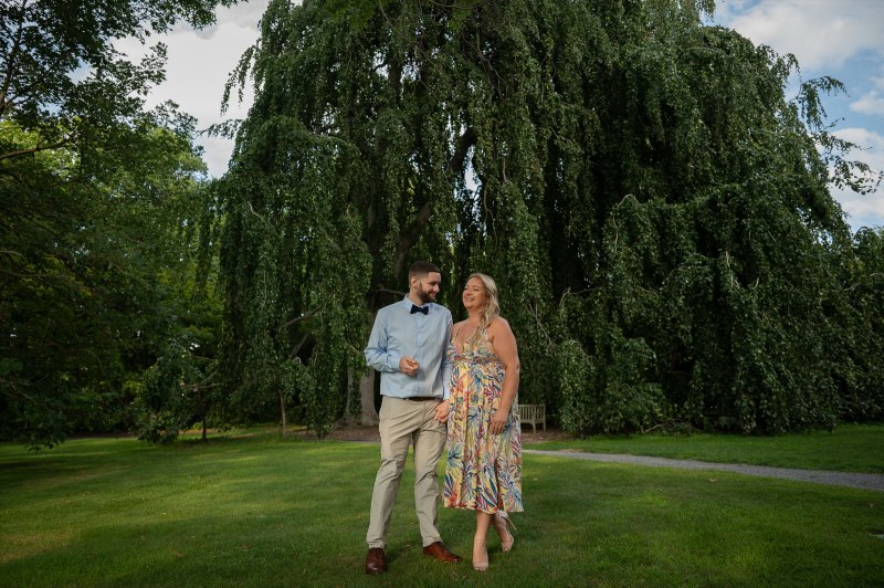 Wayne and Christy beside a willow tree
