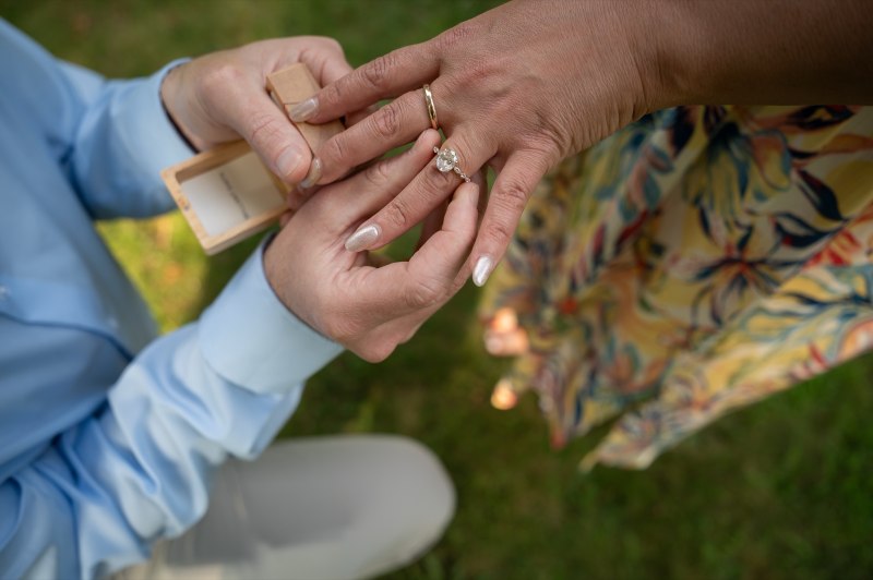 Christy’s engagement ring on her hand